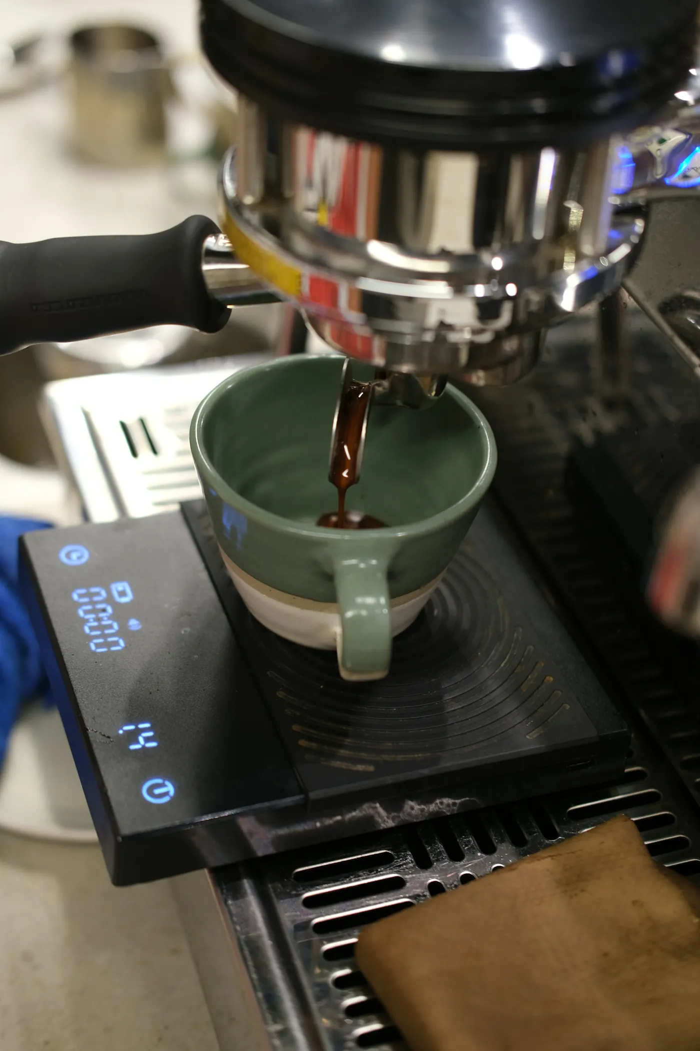 A warm pour of coffee in soft light